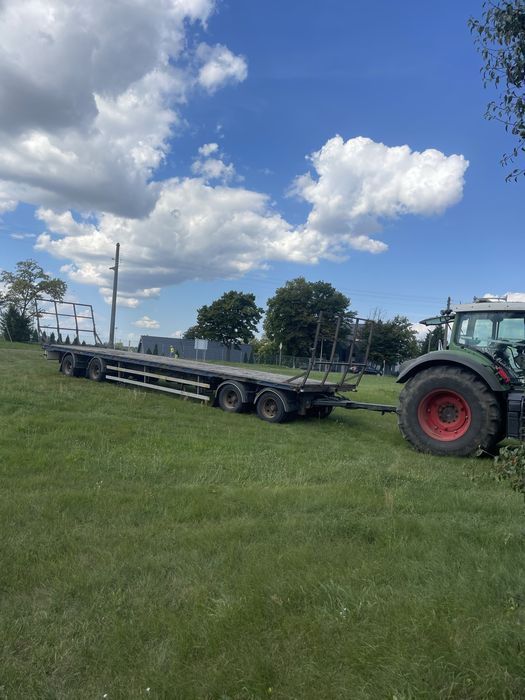 Przyczepa platforma dlużyca 4 osiowa do słomy balotów