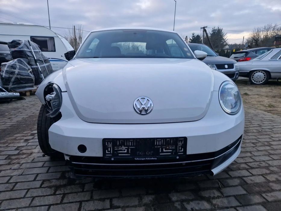Volkswagen Beetle Lekko uszkodzony,atrakcyjny wygląd,super środek!