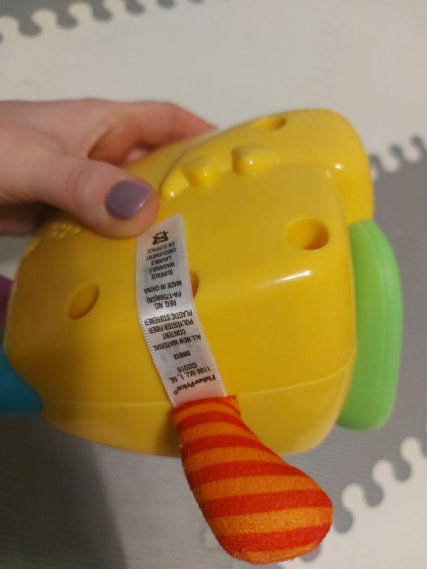 FISHER PRICE stworek humorek dzwięki zabawka interaktywna