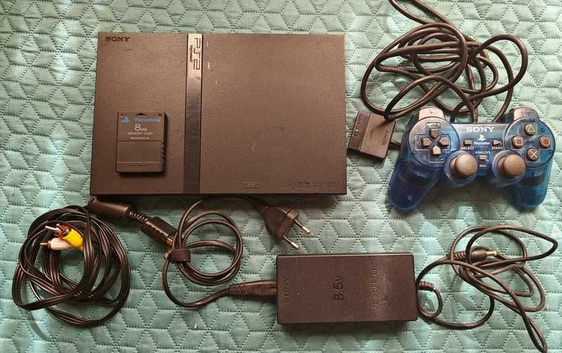 PlayStation 2 Slim + comando + 1 memory card + jogos