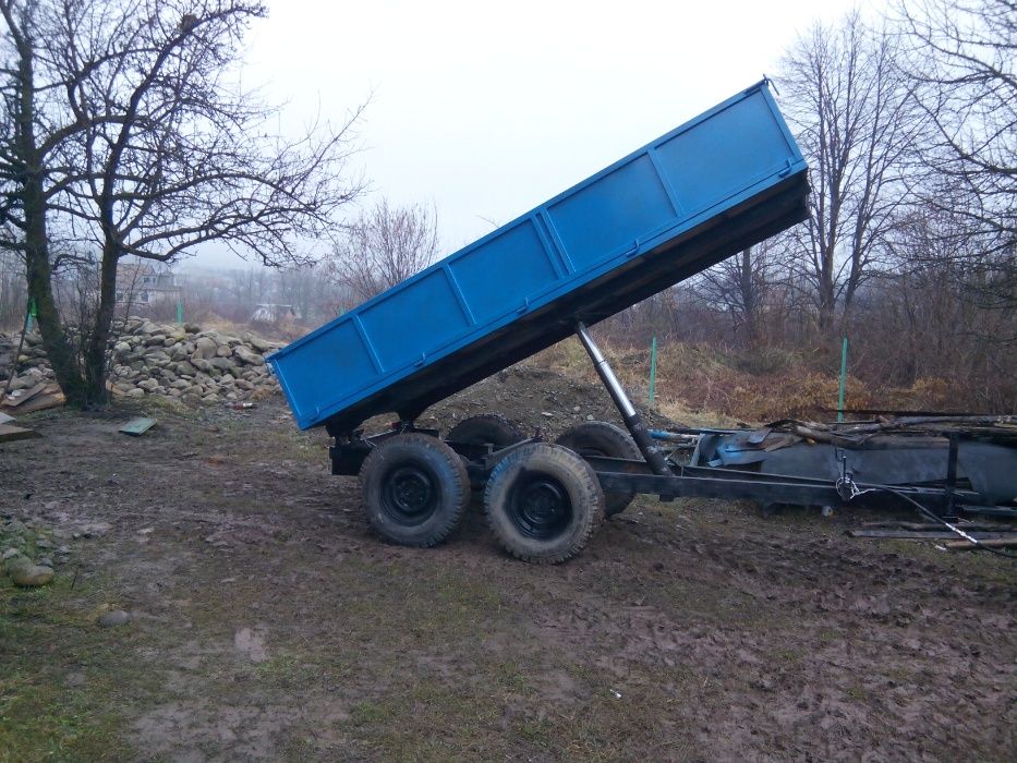 продаж прицепів .