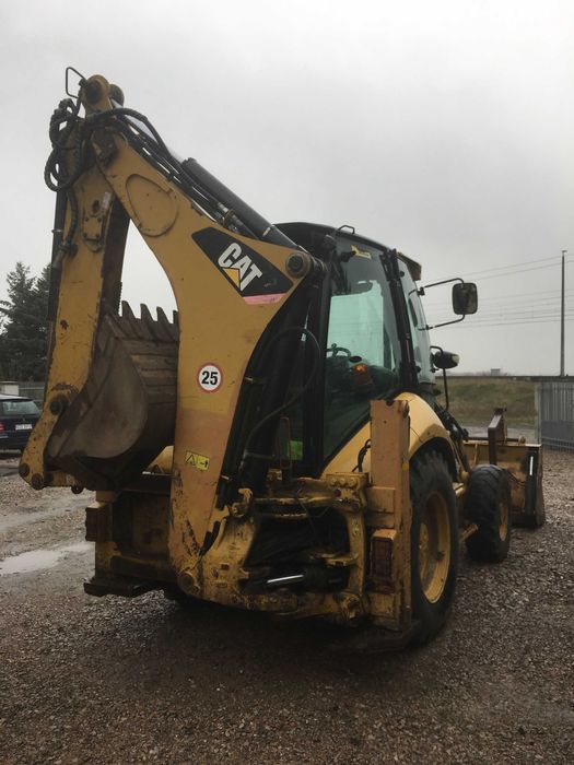 Koparko-Ładowarka Caterpillar 428E