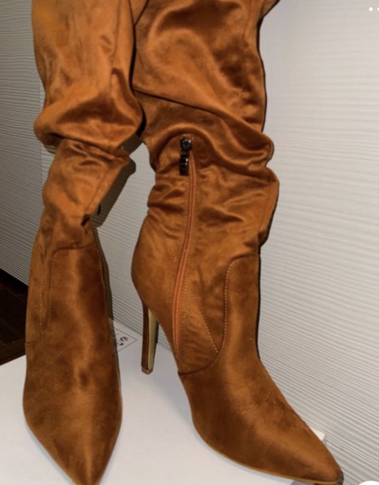 Botas cano alto enrugado