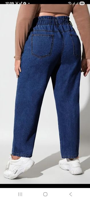 Жіночі джинси великого розміру