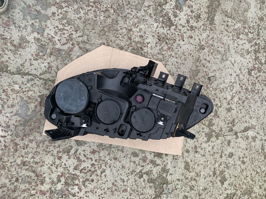 Права фара Fiat Doblo оригінал чорна фіат добло