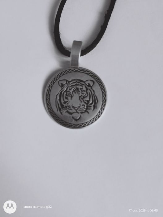 Продам серебряний кулон тигр