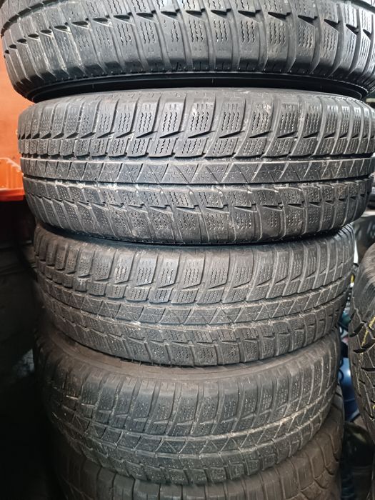 Opony Zimowe 185 65 R15 Falken.      W80