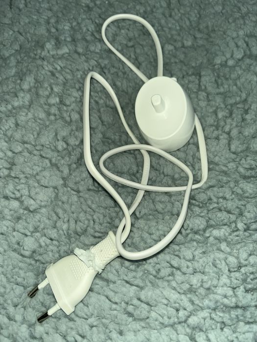 Зарядний пристрій для щіток