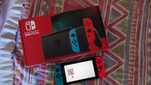 Nintendo Switch (Versão v2) + Cartão MicroSD 128GB + Bolsa