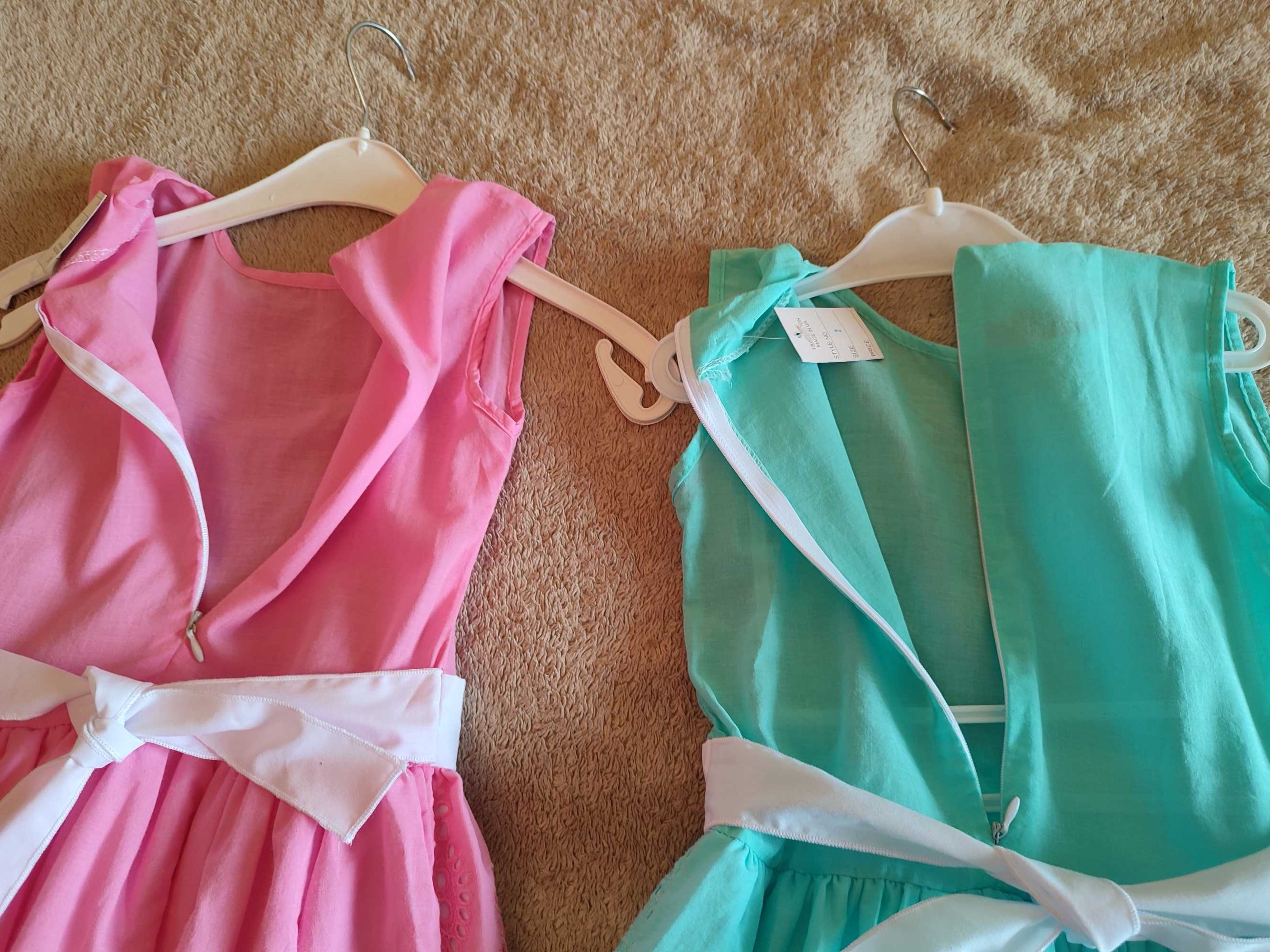 Два новых одинаковых платья на рост 128 - 132 см., розовое и бирюзовое