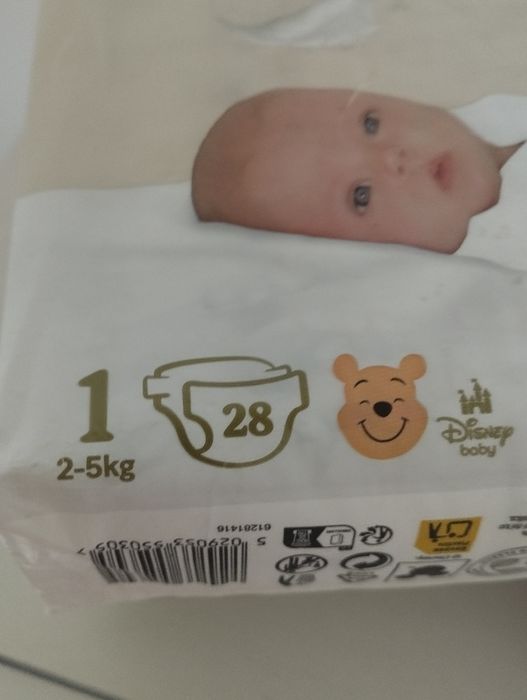 2   упаковки підгузників р1