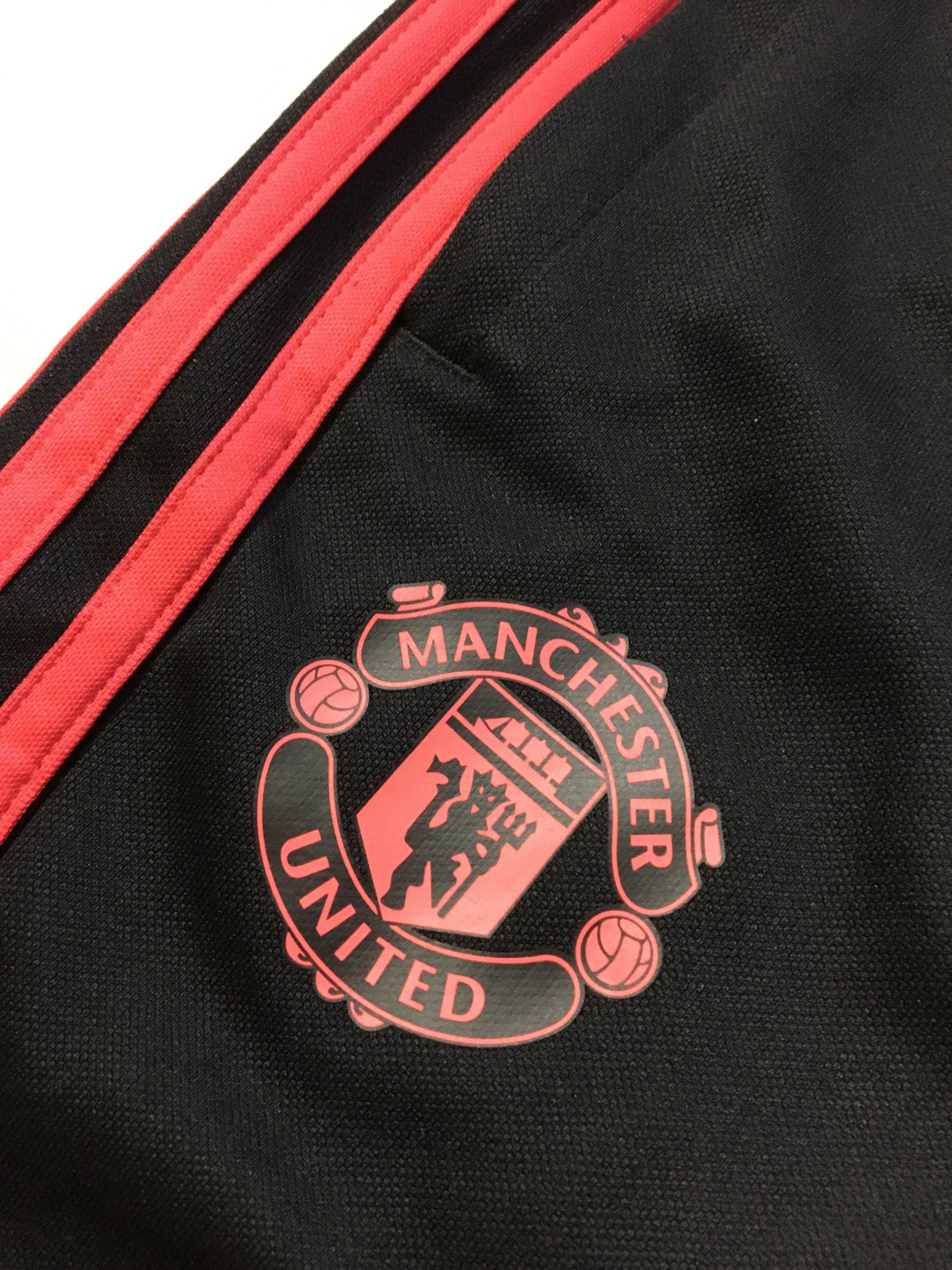 ADIDAS Manchester United r.L oryginalne spodnie sportowe stan BDB