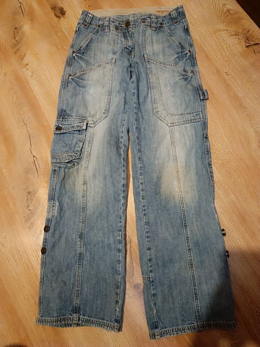 Szerokie jeansy z przetarciami New look