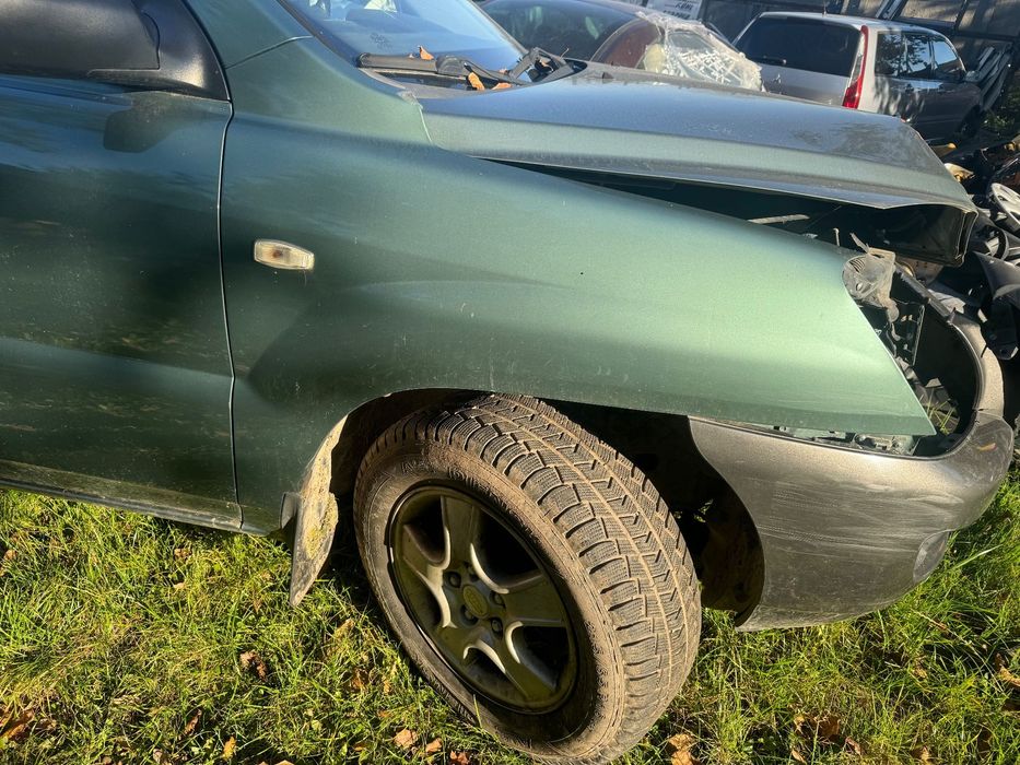 KIA SPORTAGE II 04- BŁOTNIK PRAWY PRZÓD