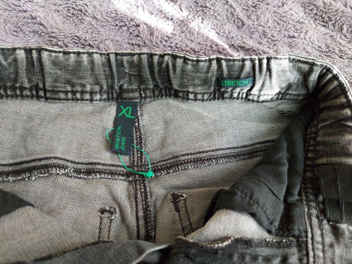 Spodnie jeansy benetton przecierane