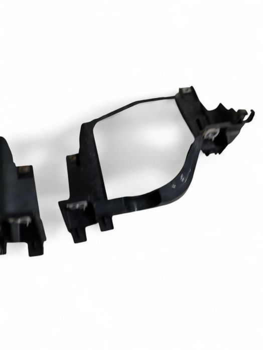 Slizg lewy prawy wspornik mocowanie lampy przod lewa prawa BMW E60 E61