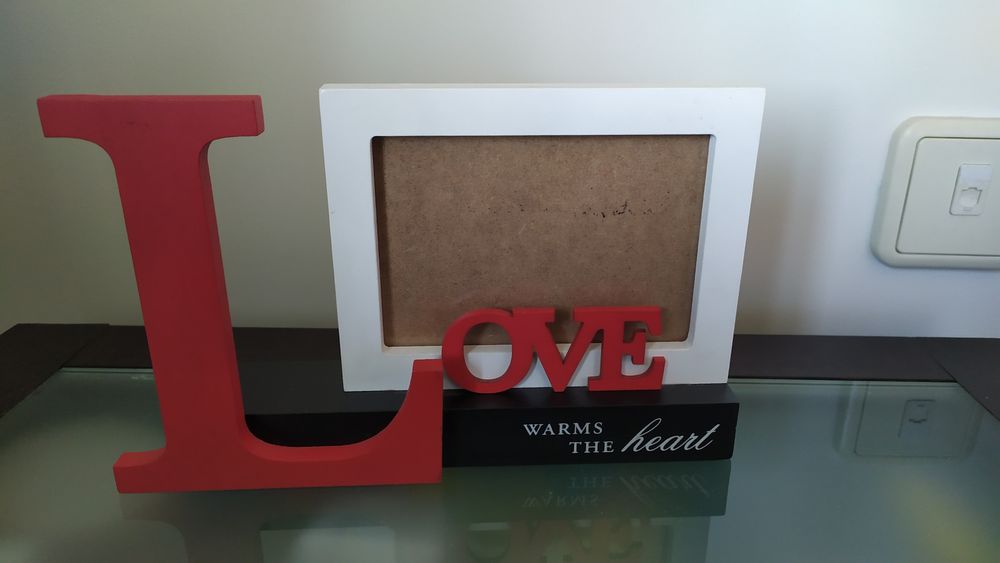 Moldura "Love warms the heart"