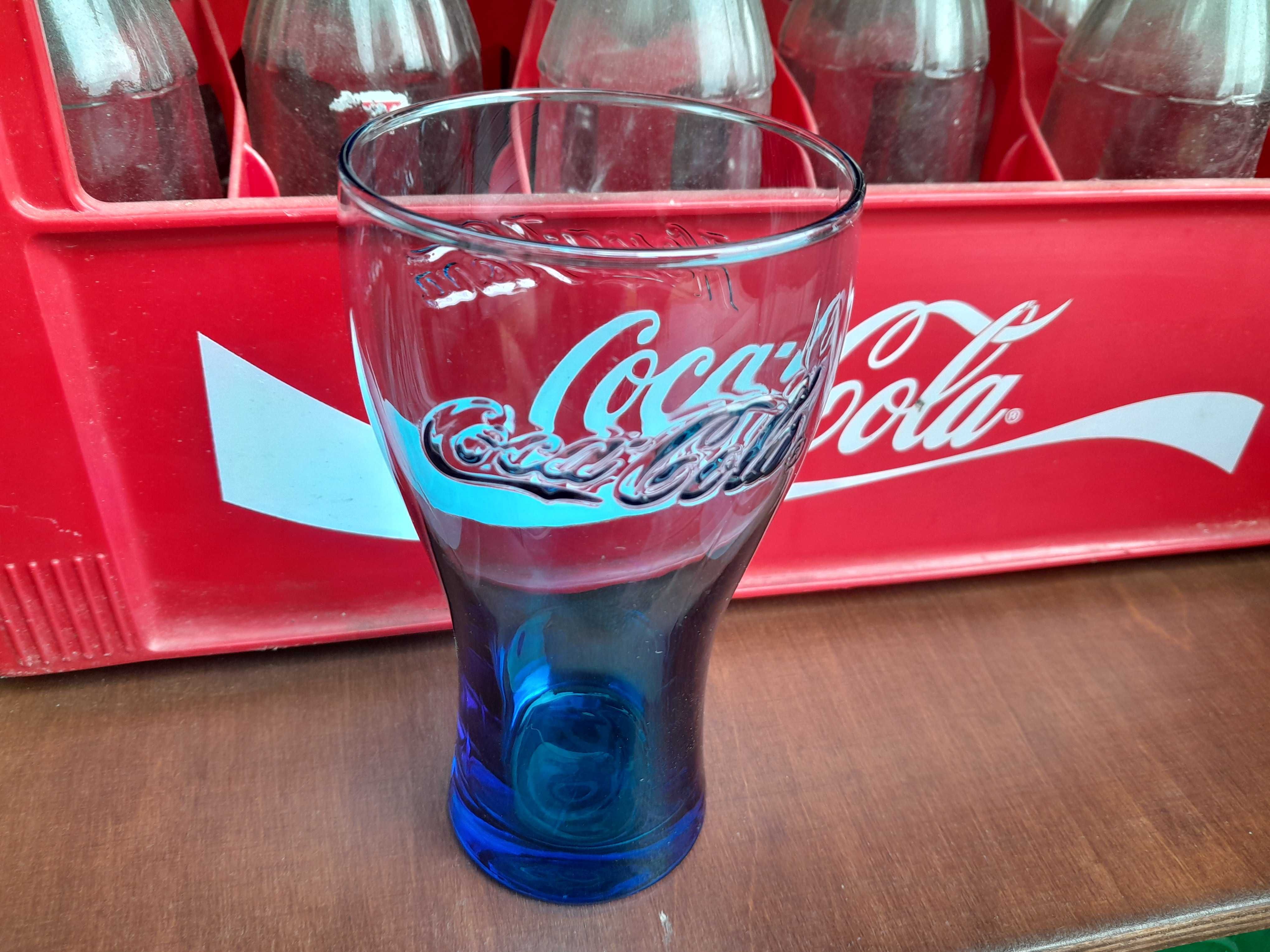 Stara używana niebieska kolekcjonerska szklanka Coca Cola