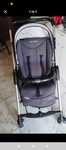 Carro de bebe já com algumas marcas de uso