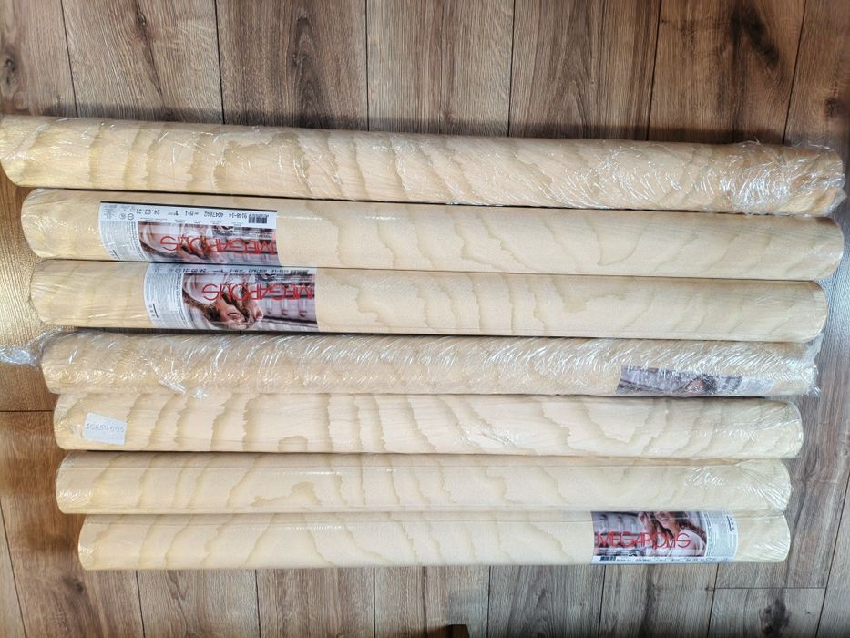 Продам Виниловые моющие обои золотистые.