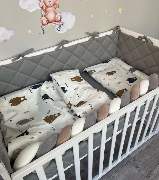 Захисні бортики в дитяче ліжечко