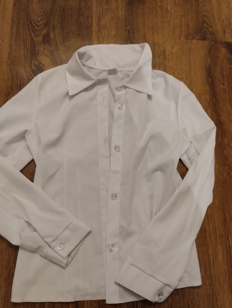 Biała koszula 140