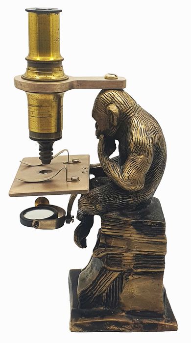Brass reproduction of a “monkey microscope”