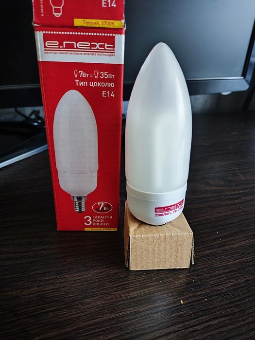 Люмінесцентна лампа E.Next E14, 7Вт, 35Лм, 2700К жовте світло.