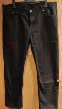 Czarne spodnie męskie jeansy Levi's r 42/32