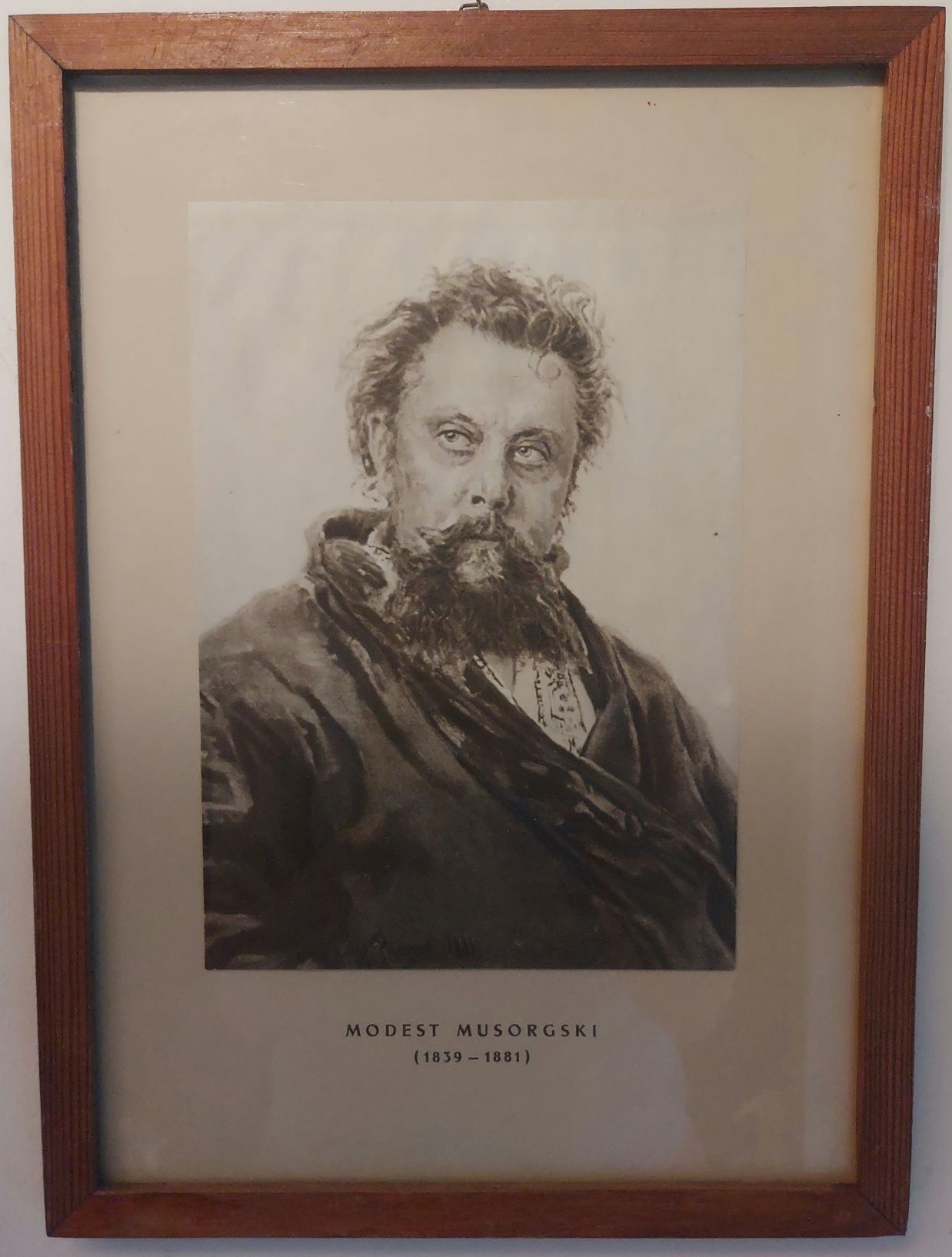Kolekcja portretów największych kompozytorów w drewnianych ramach