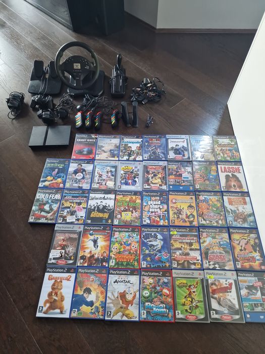 Sprzedam PlayStation 2 plus gry