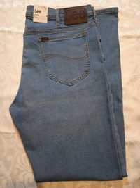 Lee Rider Slim niebieskie spodnie jeansy W38 L34 + Gratis!