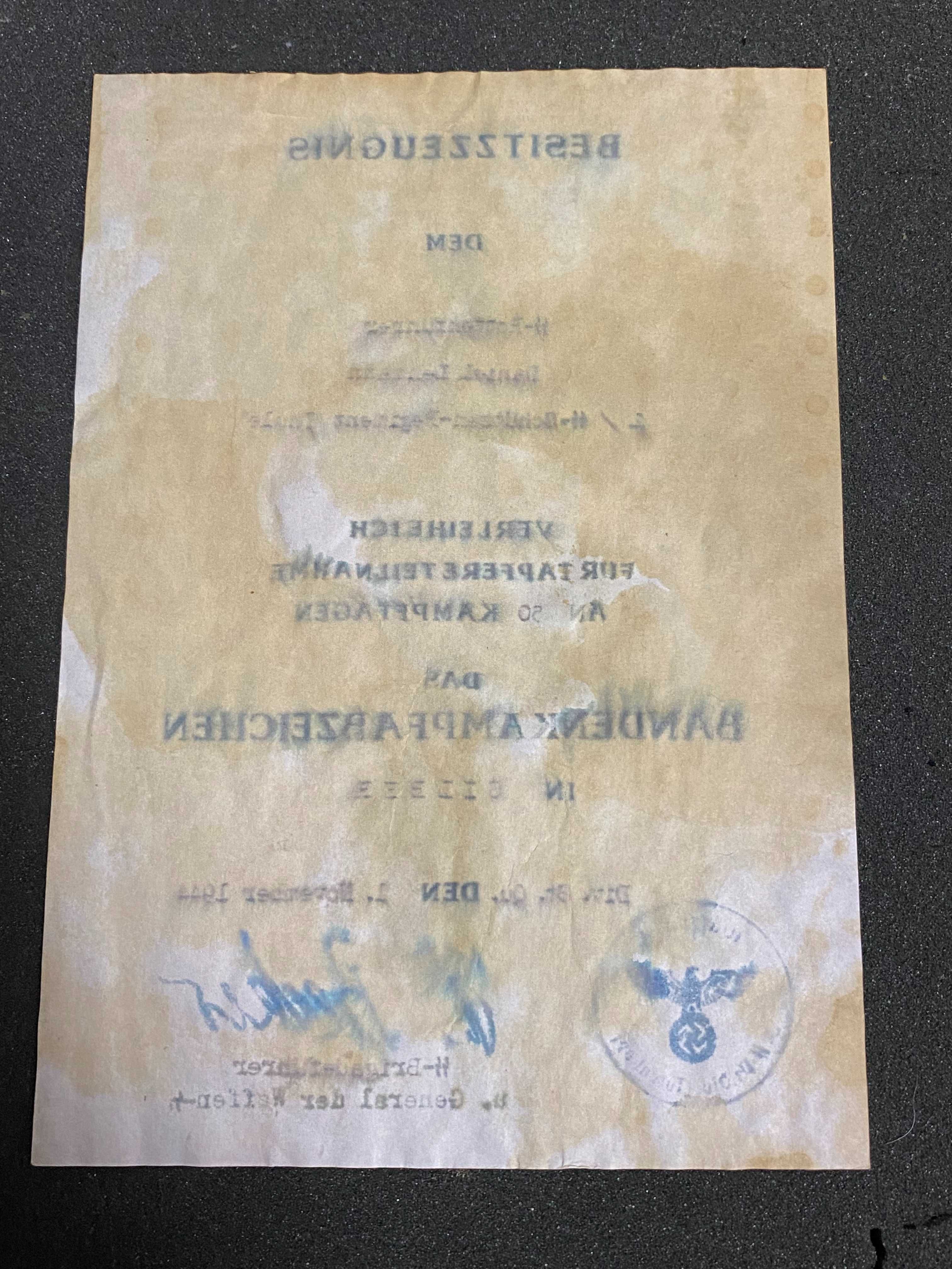 Niemcy 2 wojna SS dokument  odznaki  za walke z partyzantami !!