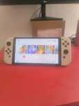 Nintendo Switch OLED + 2 jogos