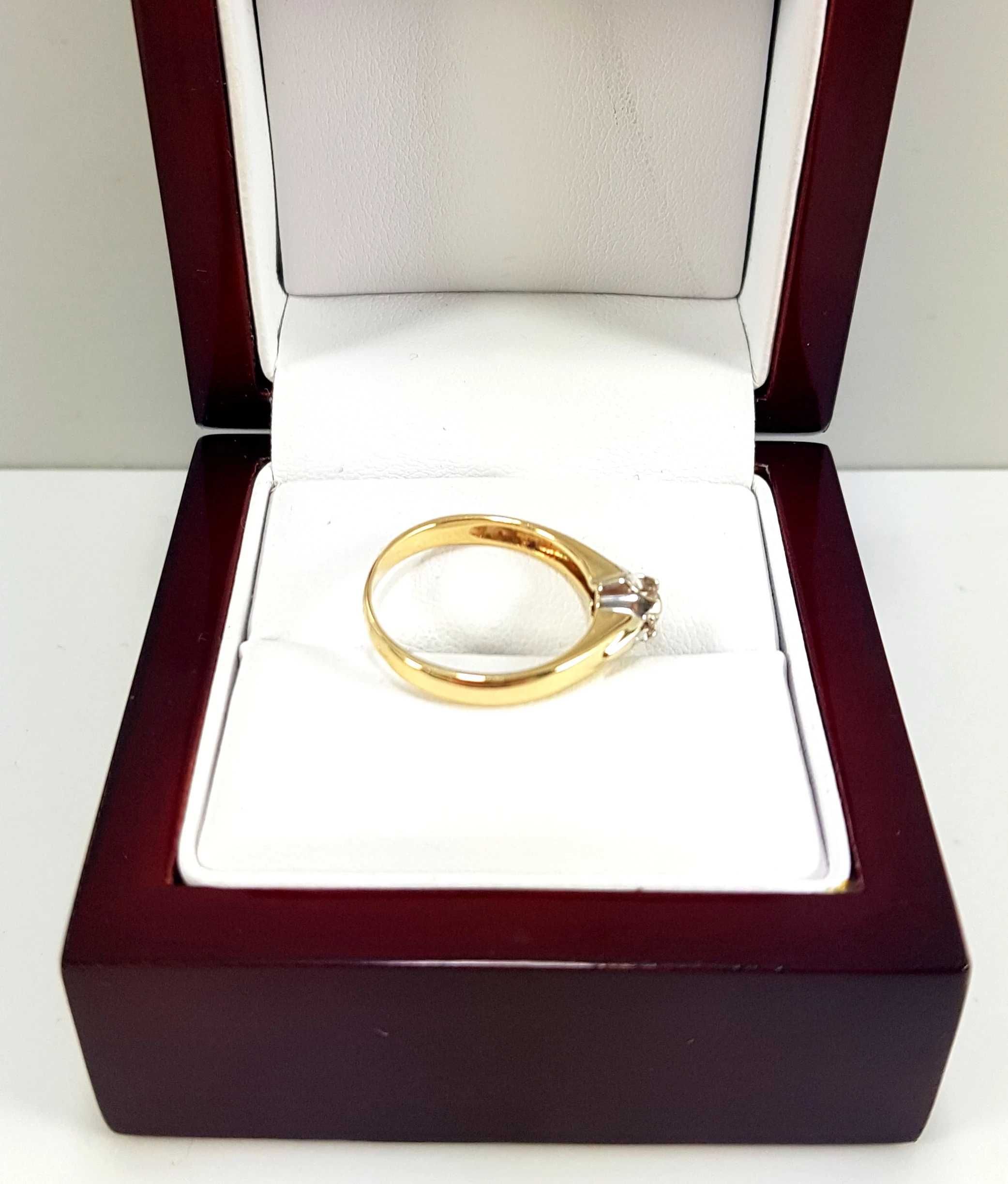 Złoty pierścionek z brylantem 0,09CT 585 2,78G R14