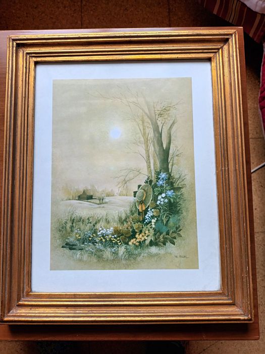 Quadro com moldura dourada