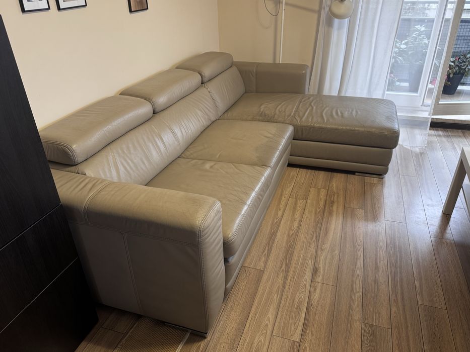 Skórzany narożnik kanapa z funkcja spania i pojemnikiem