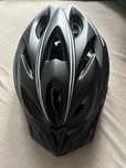 nowy kask rowerowy czarny z białymi paskami