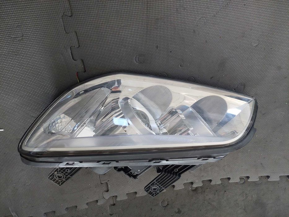 farol esq Chevrolet captiva