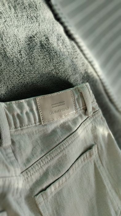 Світлі джинси мом