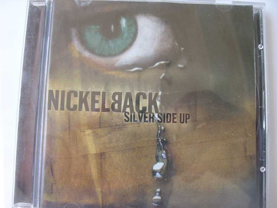 Rock CD; Nickelback--Silver side up.