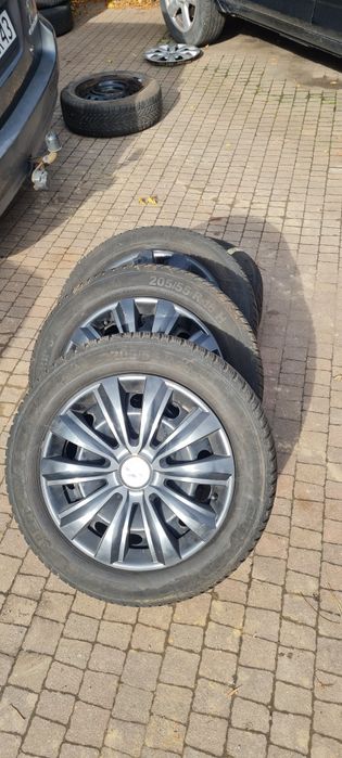 Opony zimowe + felgi stalowe + kołpaki