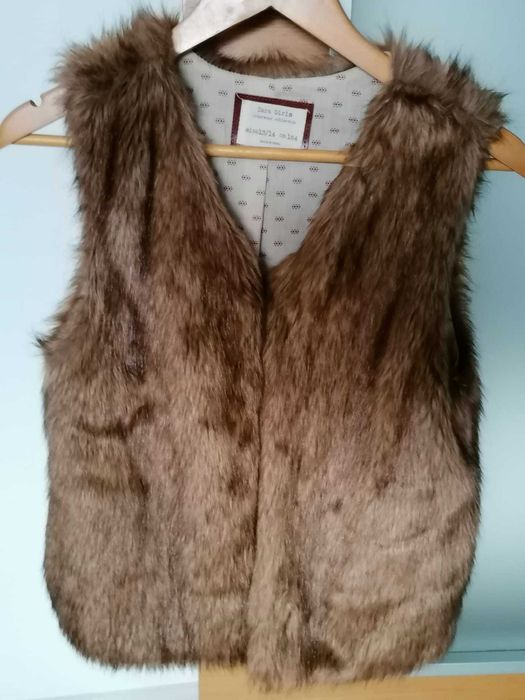 Colete de pêlo
Castanho claro
Tam 13/14 anos

Entrega em mão