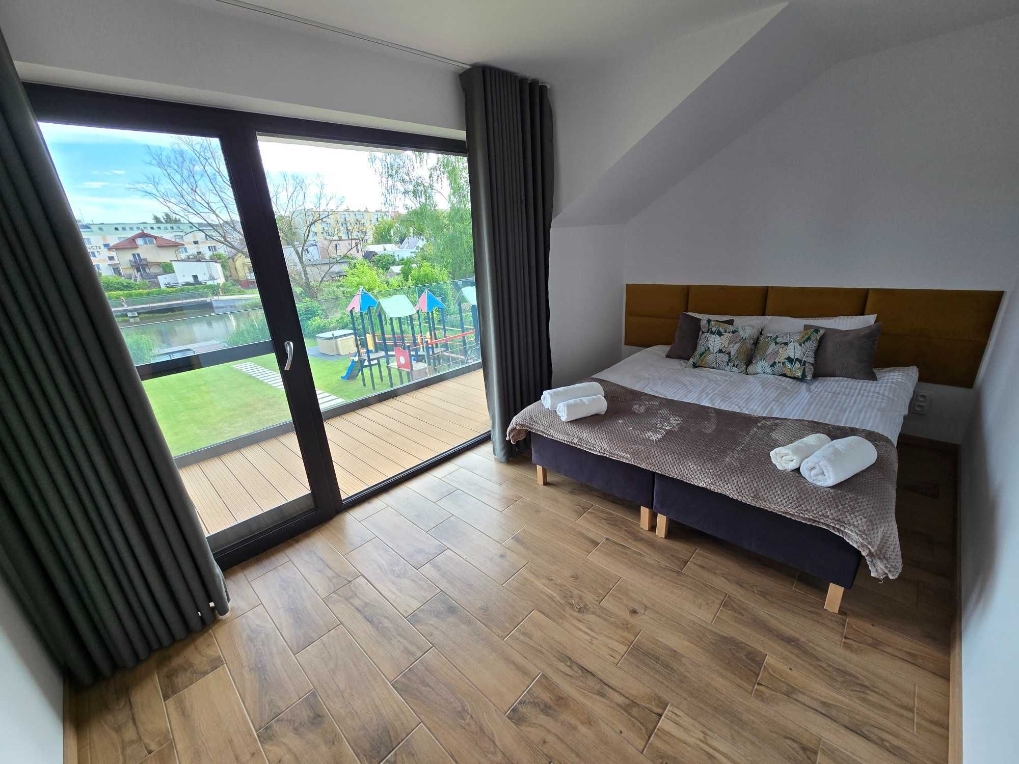 apartamenty FLAUTA w centrum nad rzeką Iławką, balia, ognisko, pomost