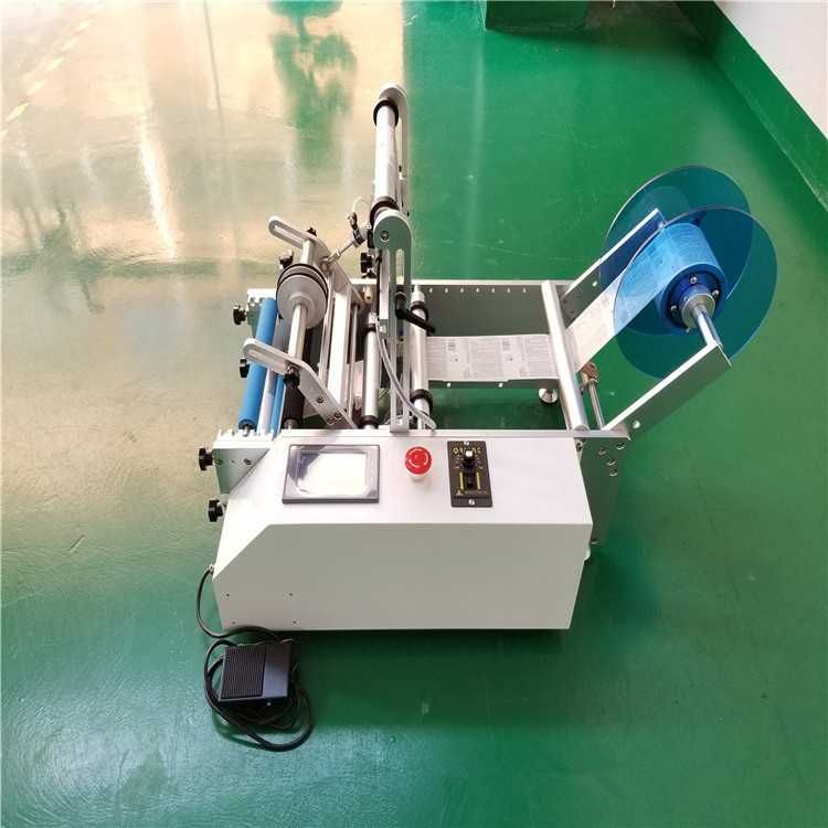 Máquina de rotulagem semiautomática para latas de garrafas redondas