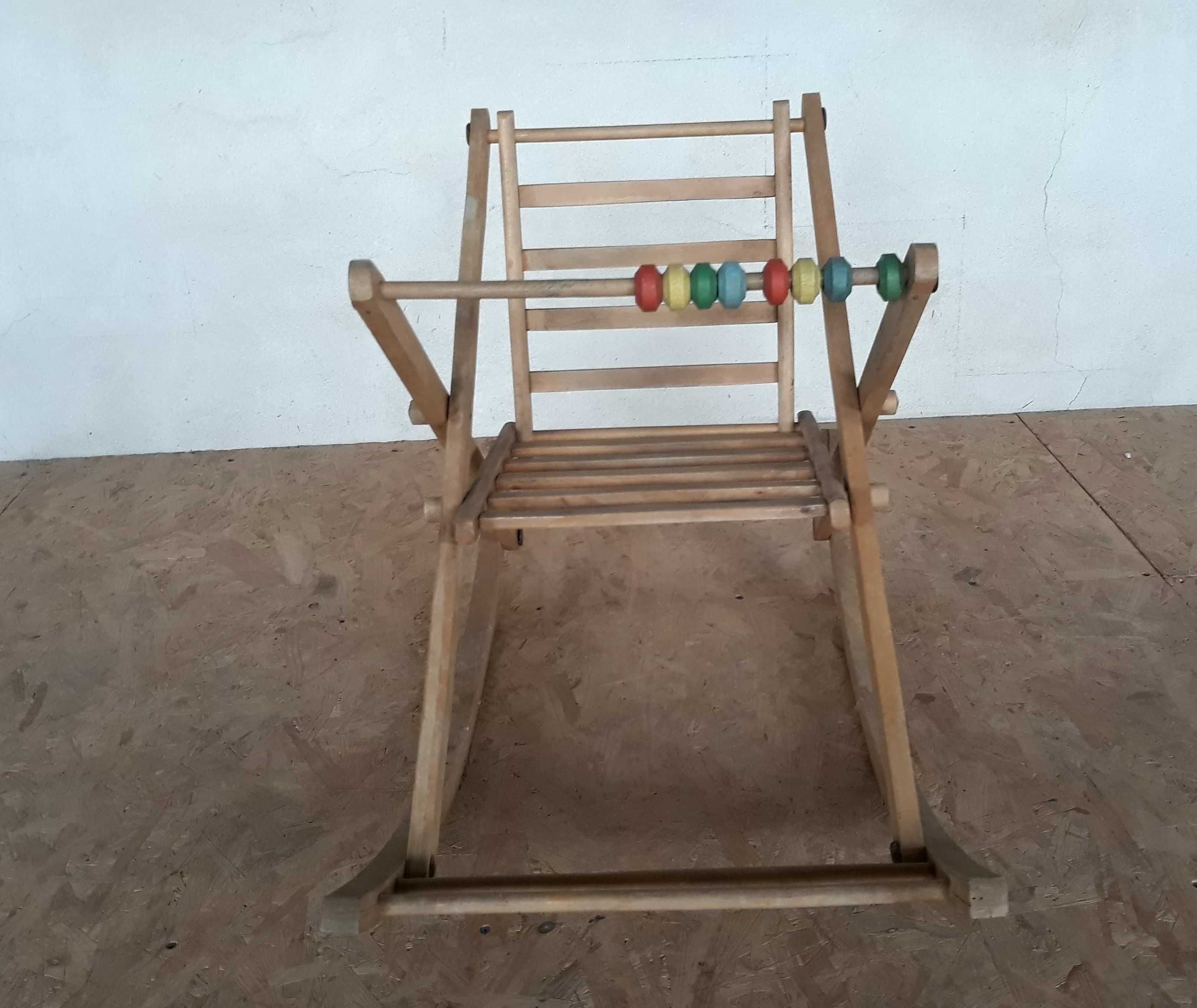 drewniany bujany fotelik dla dziecka PRL