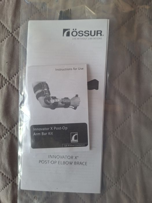 Orteza stawu łokciowego lewego z zegarem ÖSSUR z instrukcją