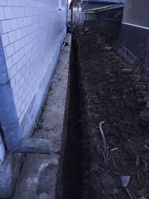 Чистка криниць колодязів колодців копка каналізацій