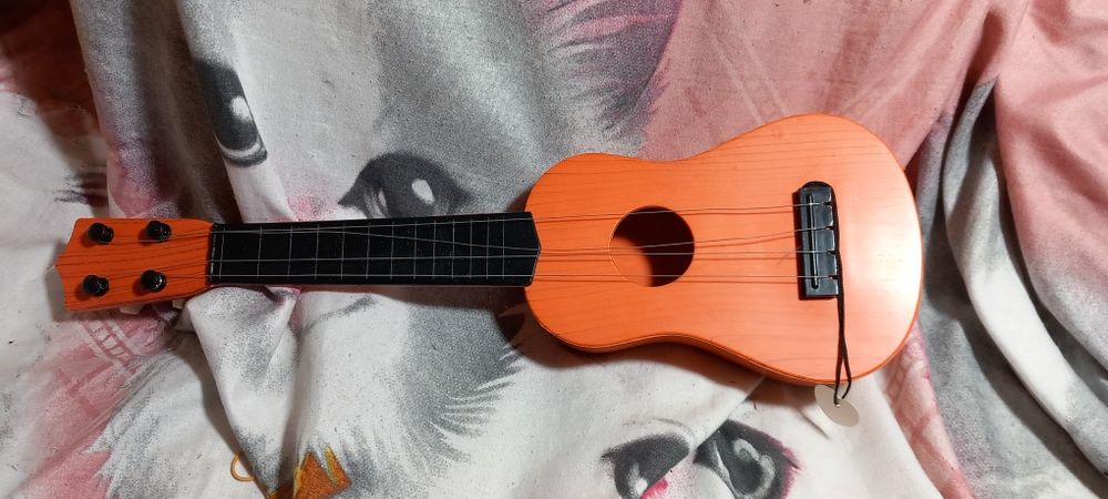 Guitarra criança