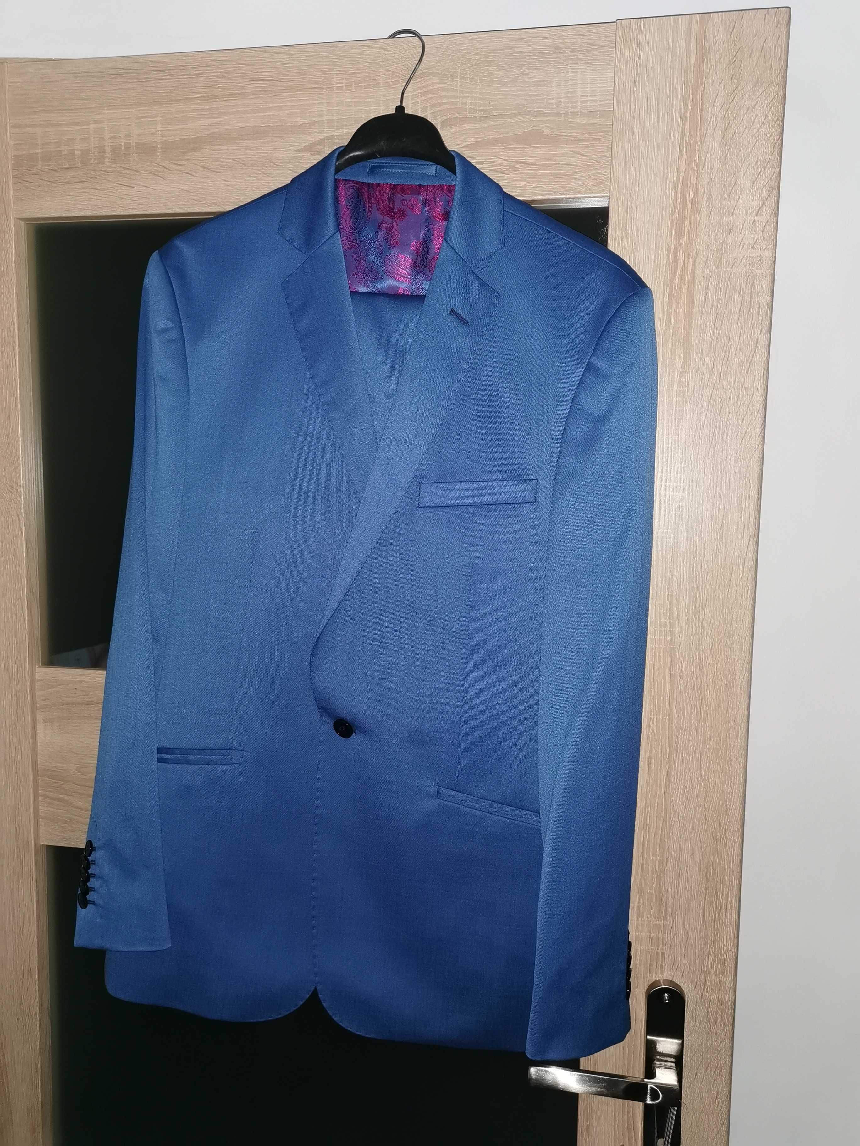 Niebieski garnitur jak nowy Giacomo Conti